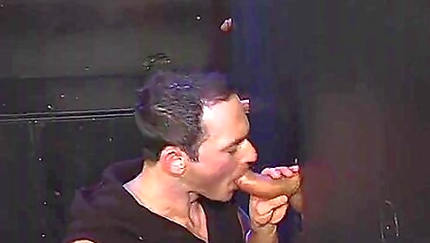 Gloryhole Performer Is Blowing Two Hard Dicks