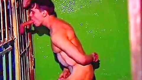 Stunning Hunk Is Sucking A Hard Boner Through The Cage